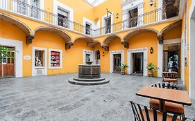 מלון פואבלה Ayenda Meson De San Sebastian Exterior photo