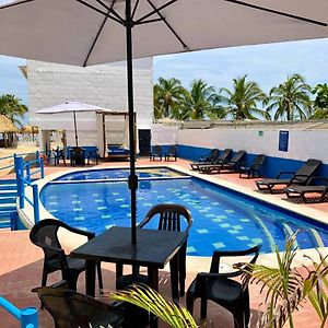 Nicomar Cabanas Familiares En Covenas Con Piscina Frente A La Playa Exterior photo