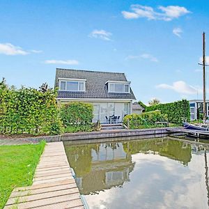 Boornzwaag over de Wielen Waterfront Holiday Home With Jetty Exterior photo