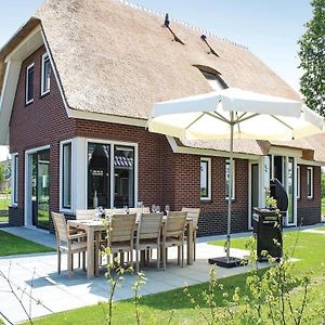 Idskenhuizen Atmospheric Villa With Nice Garden In A Holiday Park At The Water In Friesland Exterior photo