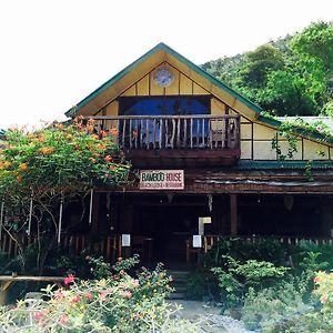 פוארטו גאלרה Bamboo House Beach Lodge & Restaurant Exterior photo