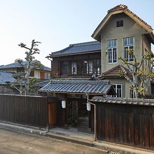 מלון אוקיאמה Tsumugiya Ryokan Exterior photo